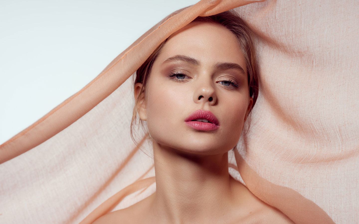 Close up portrait of woman wearing makeup for Tarleyso Beauty